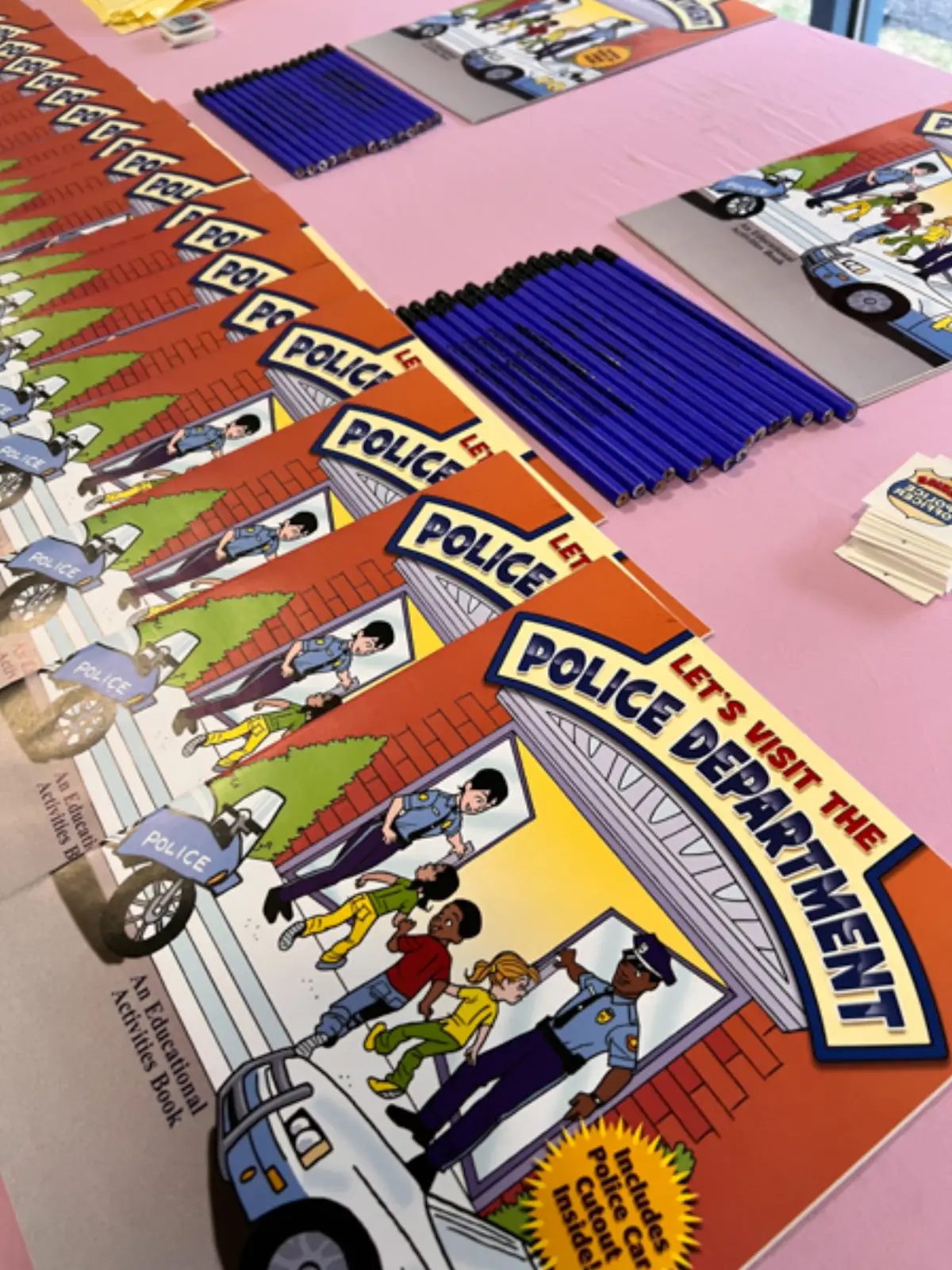 Children browsing through books at the Books and Breakfast literacy event