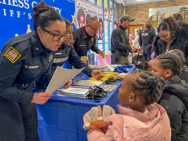 Children creating arts and crafts projects at the Books and Breakfast event