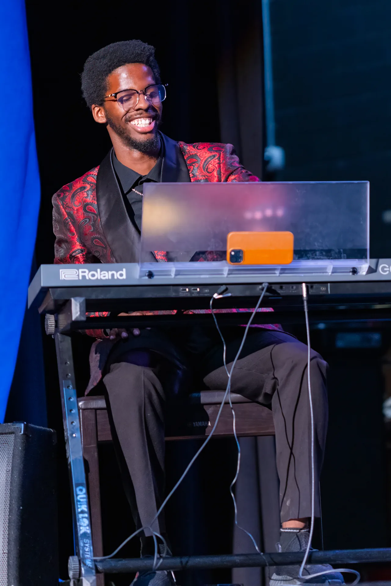 Musician performing on Roland keyboard during Culture Shock